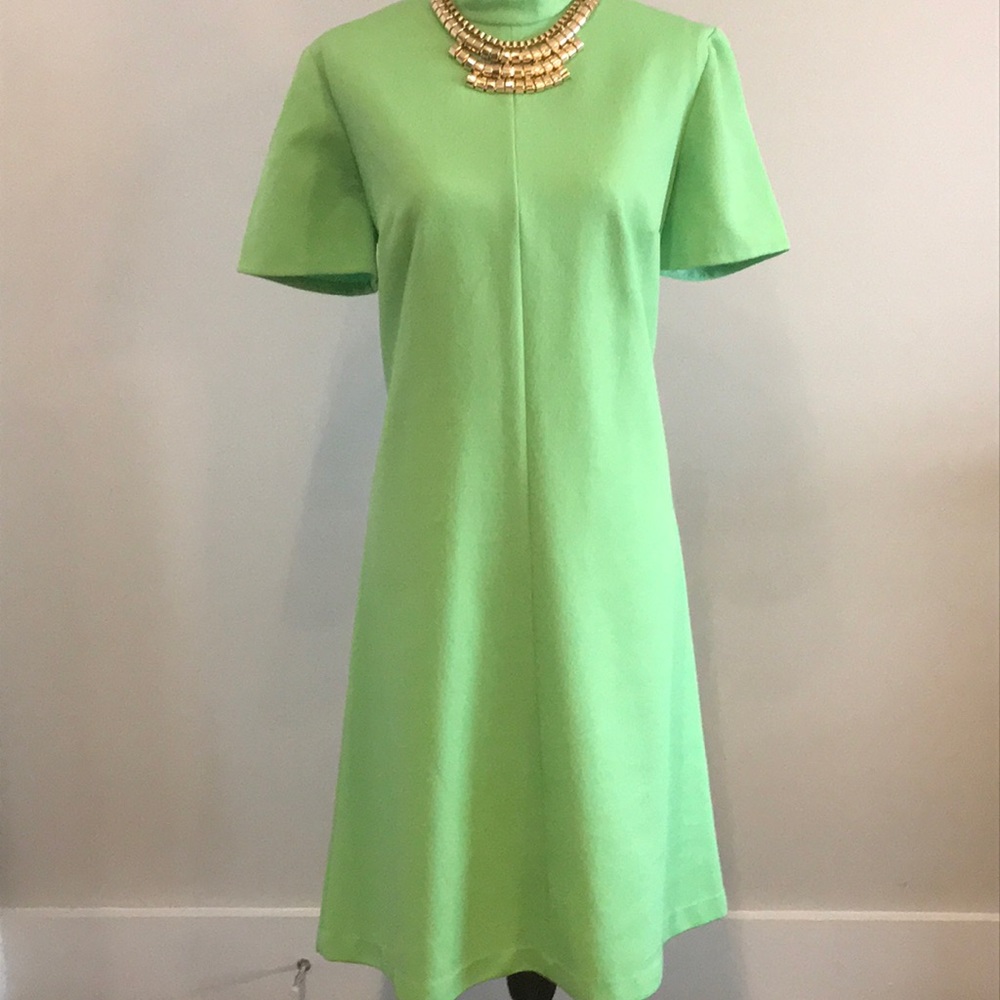 A mid length green dress